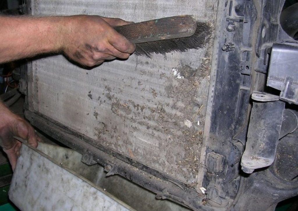 Cleaning the excavator radiator